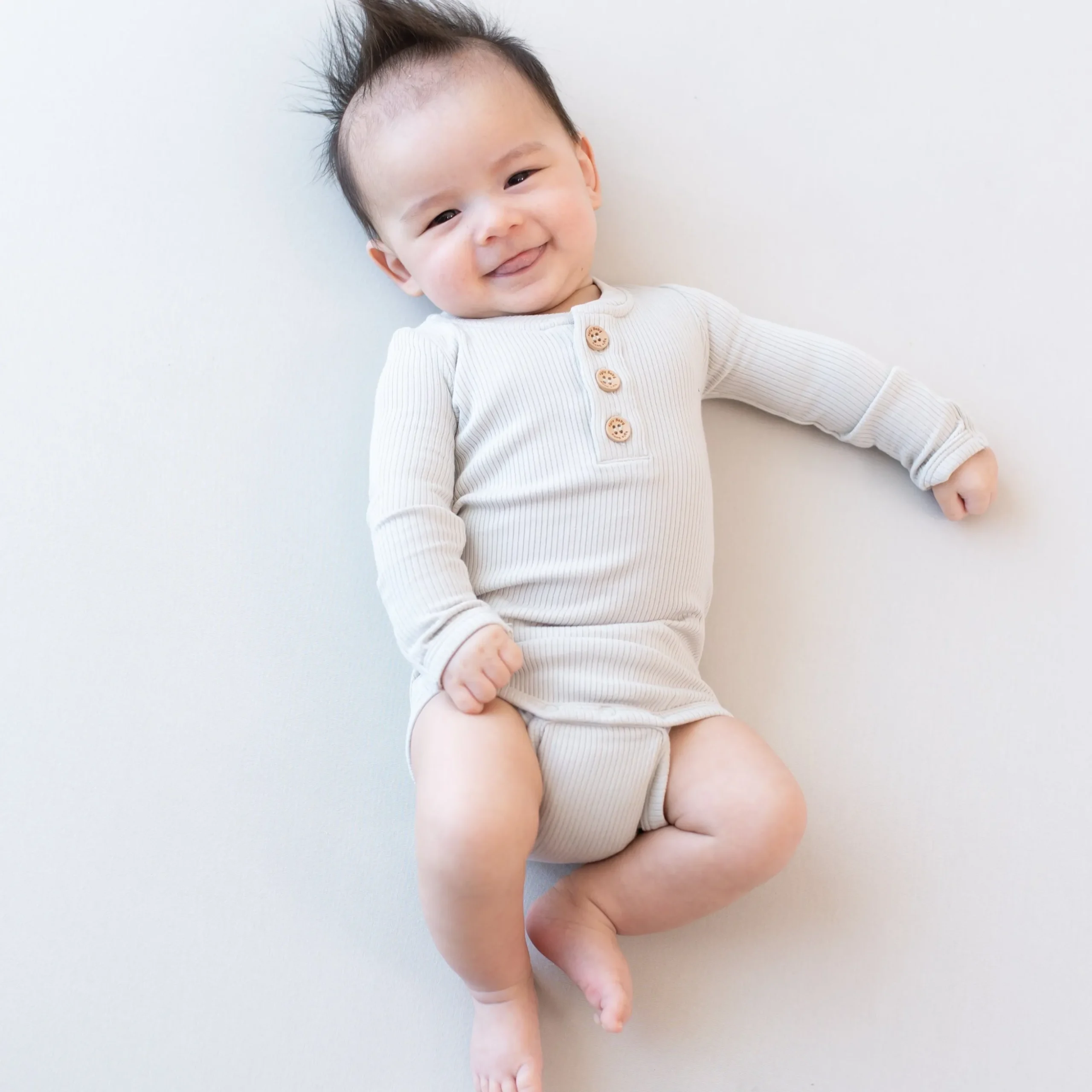 Ribbed Long Sleeve Henley Bodysuit in Oat