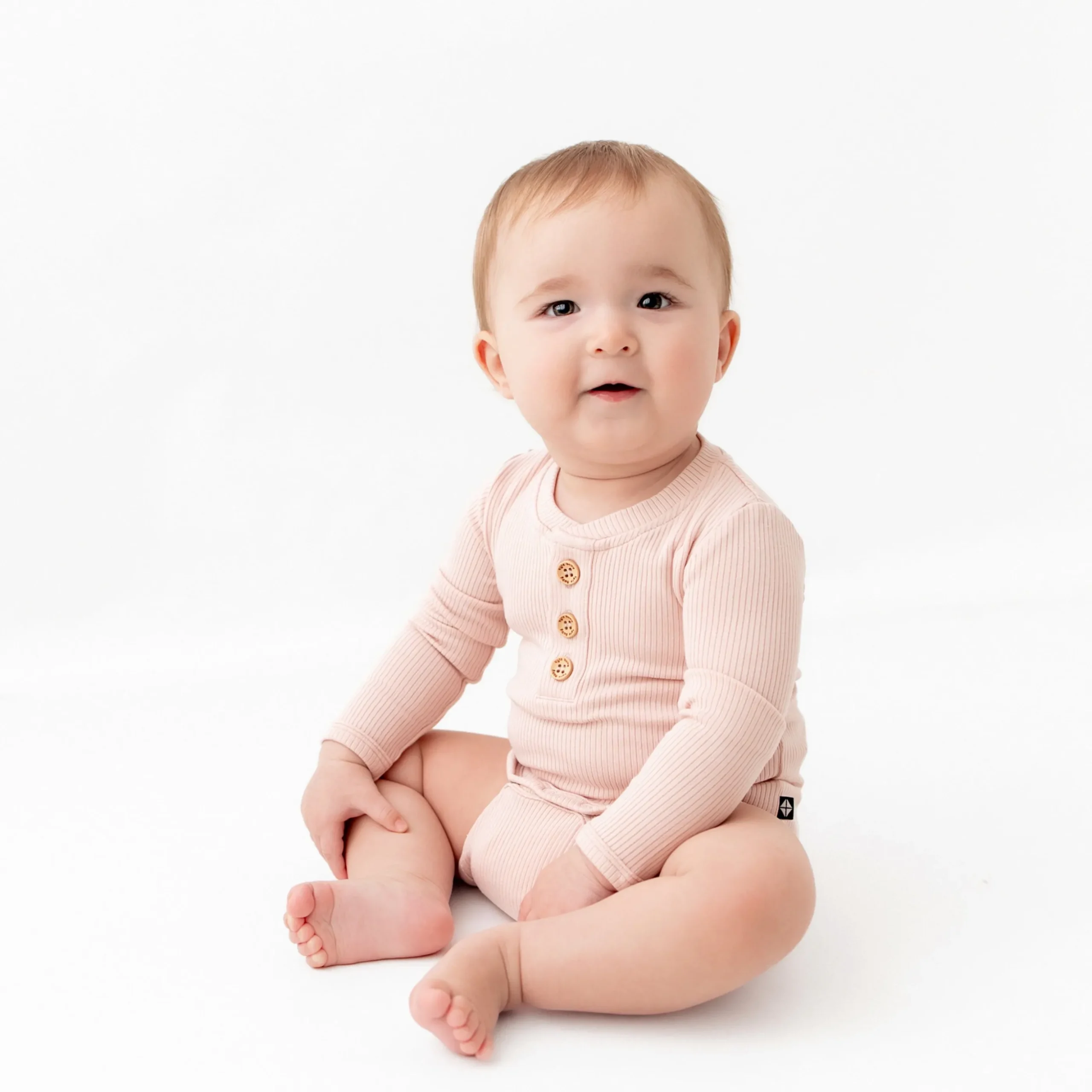 Ribbed Long Sleeve Henley Bodysuit in Blush