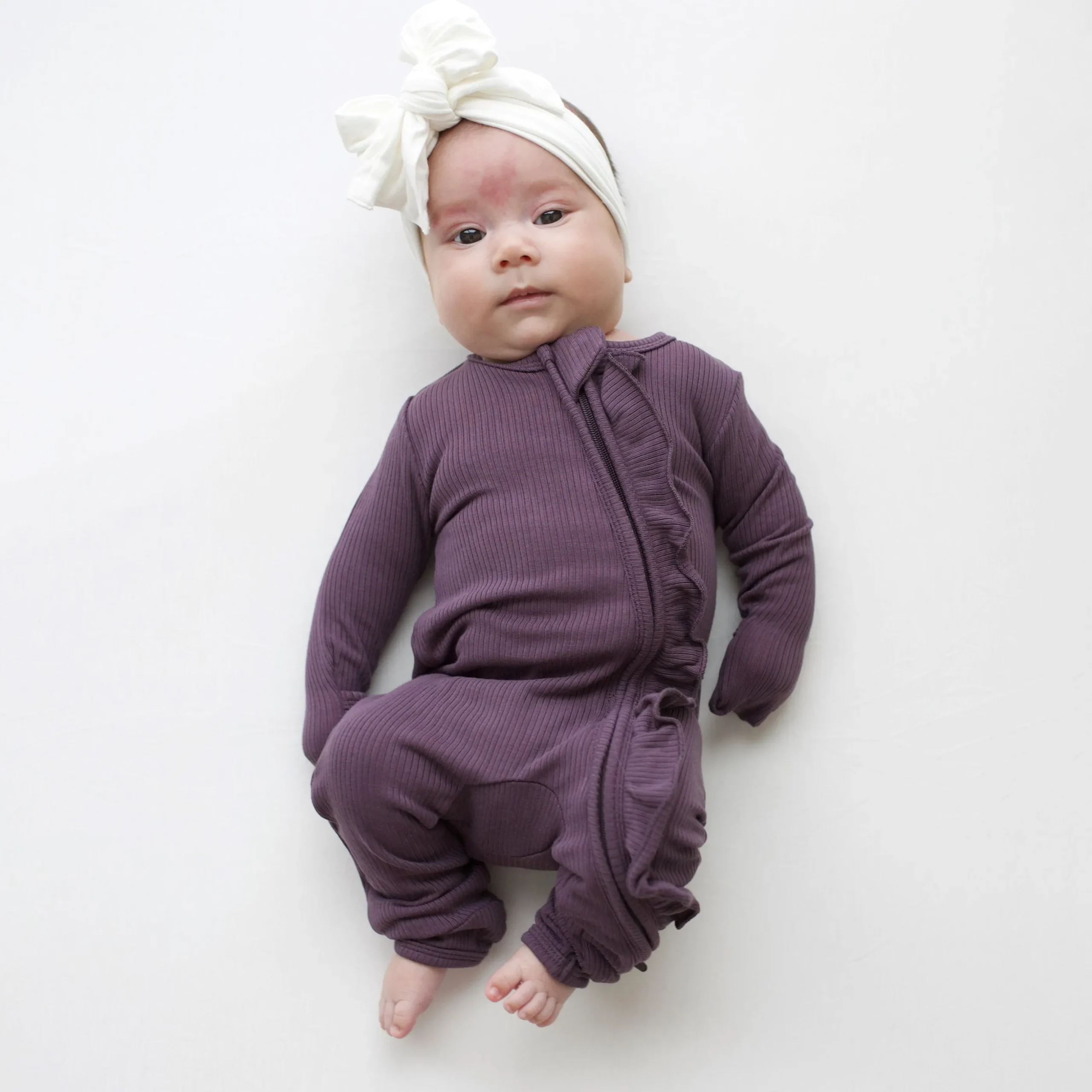 Ribbed Ruffle Zipper Romper in Currant
