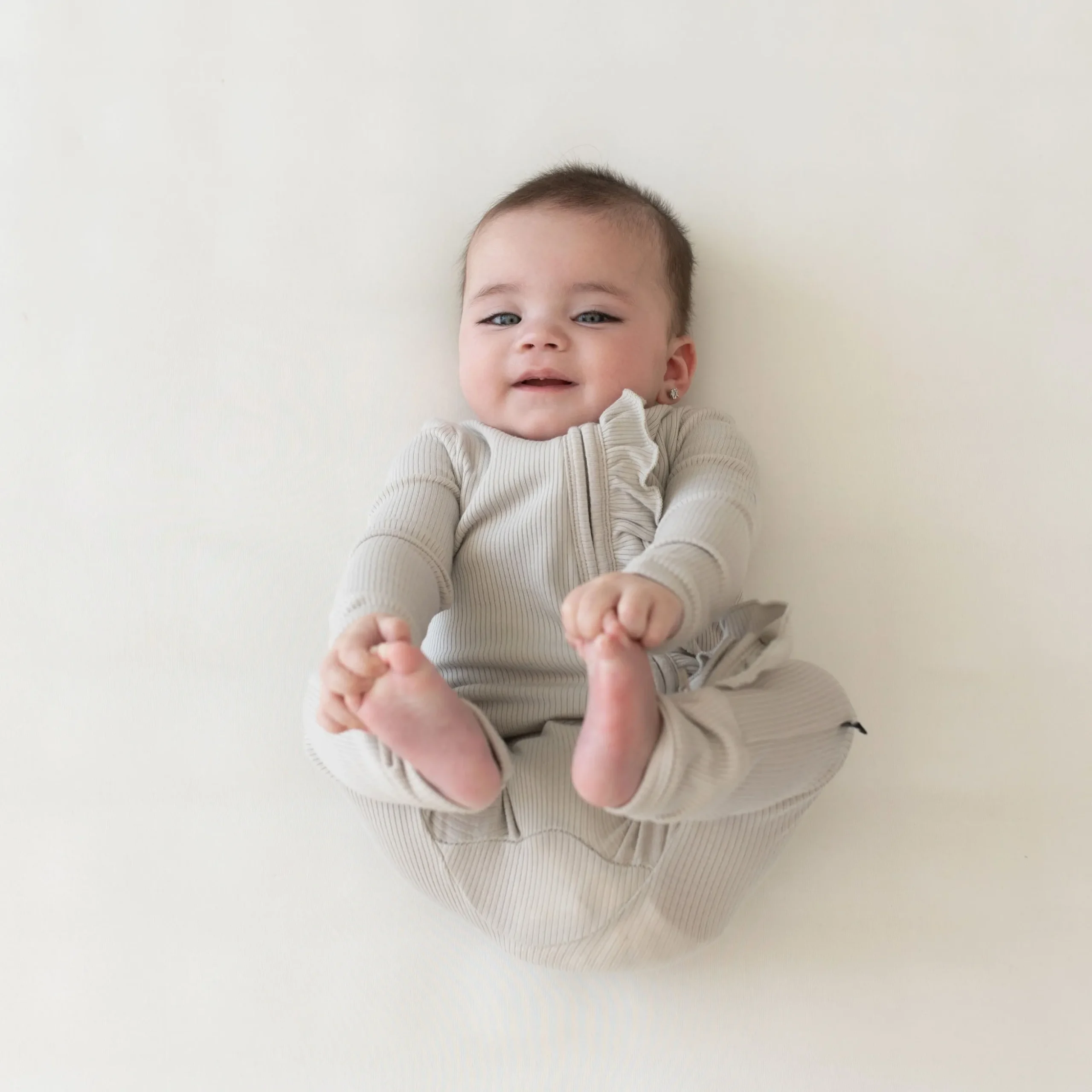Ribbed Ruffle Zipper Romper in Oat