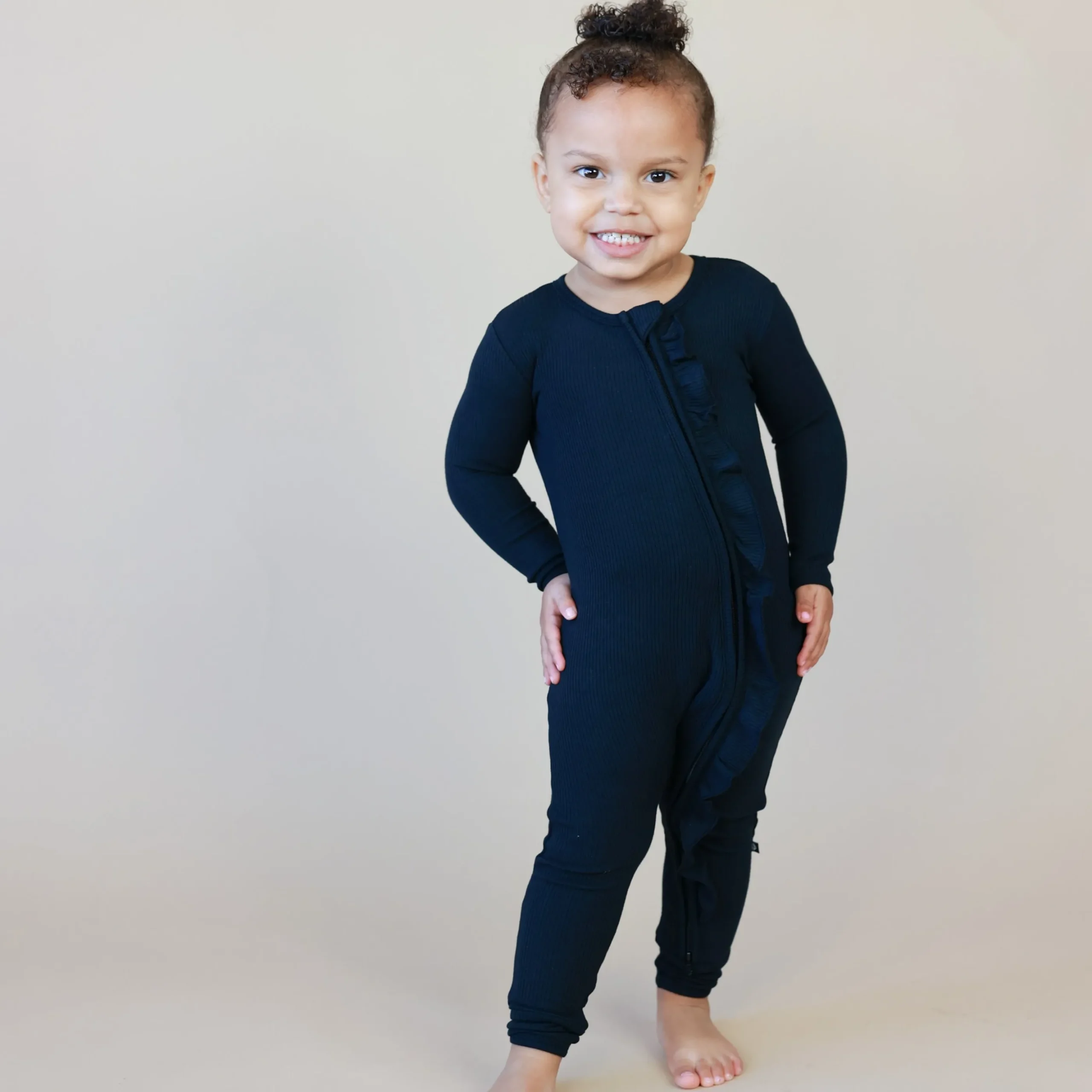 Ribbed Ruffle Zipper Romper in Midnight