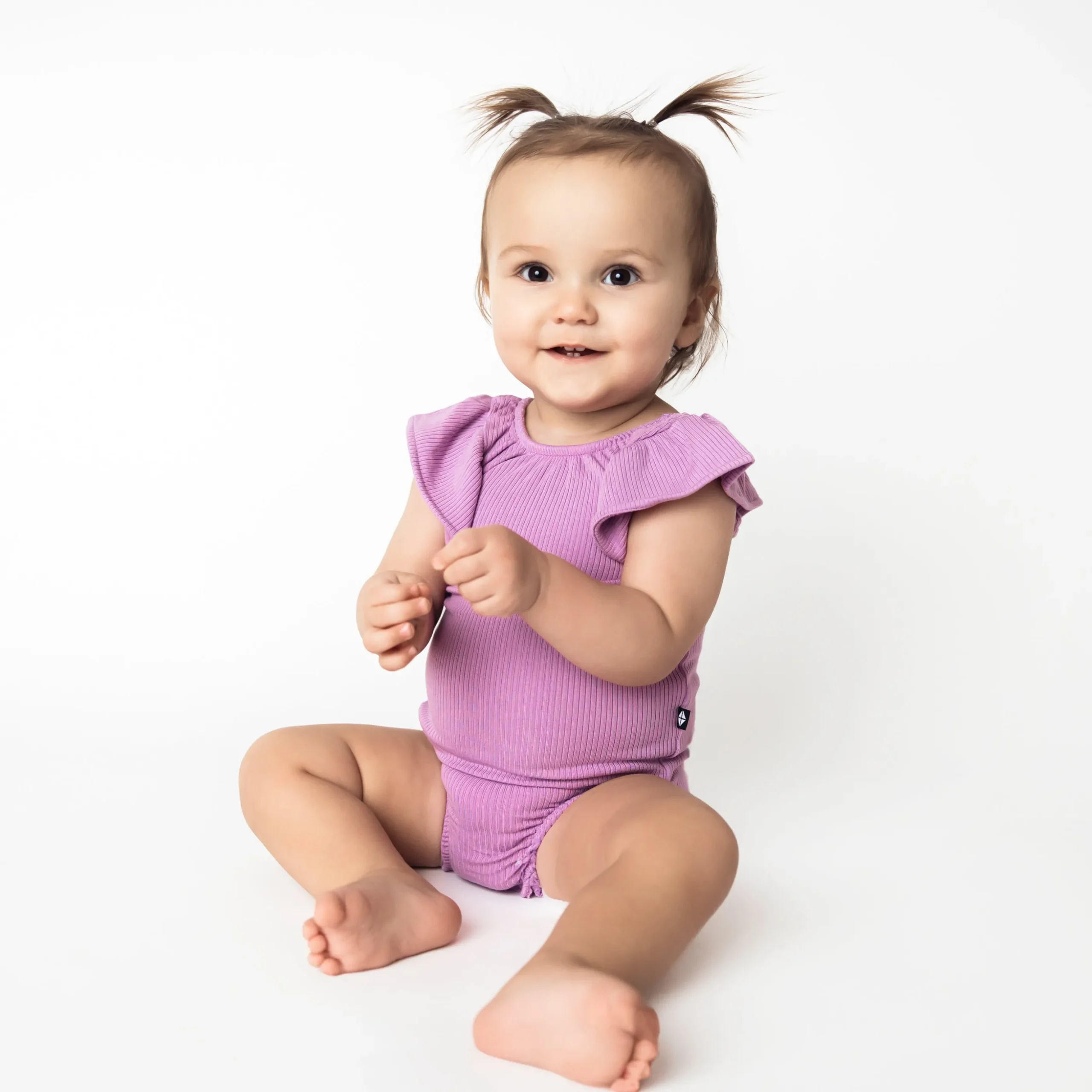 Ribbed Sleeveless Ruffle Leotard in Poi