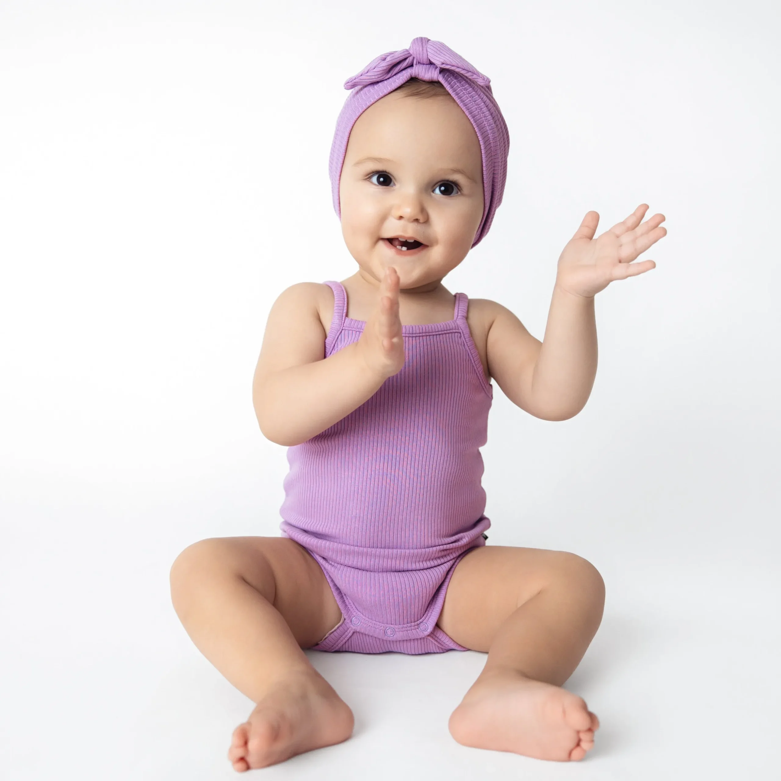 Ribbed Spaghetti Strap Bodysuit in Poi