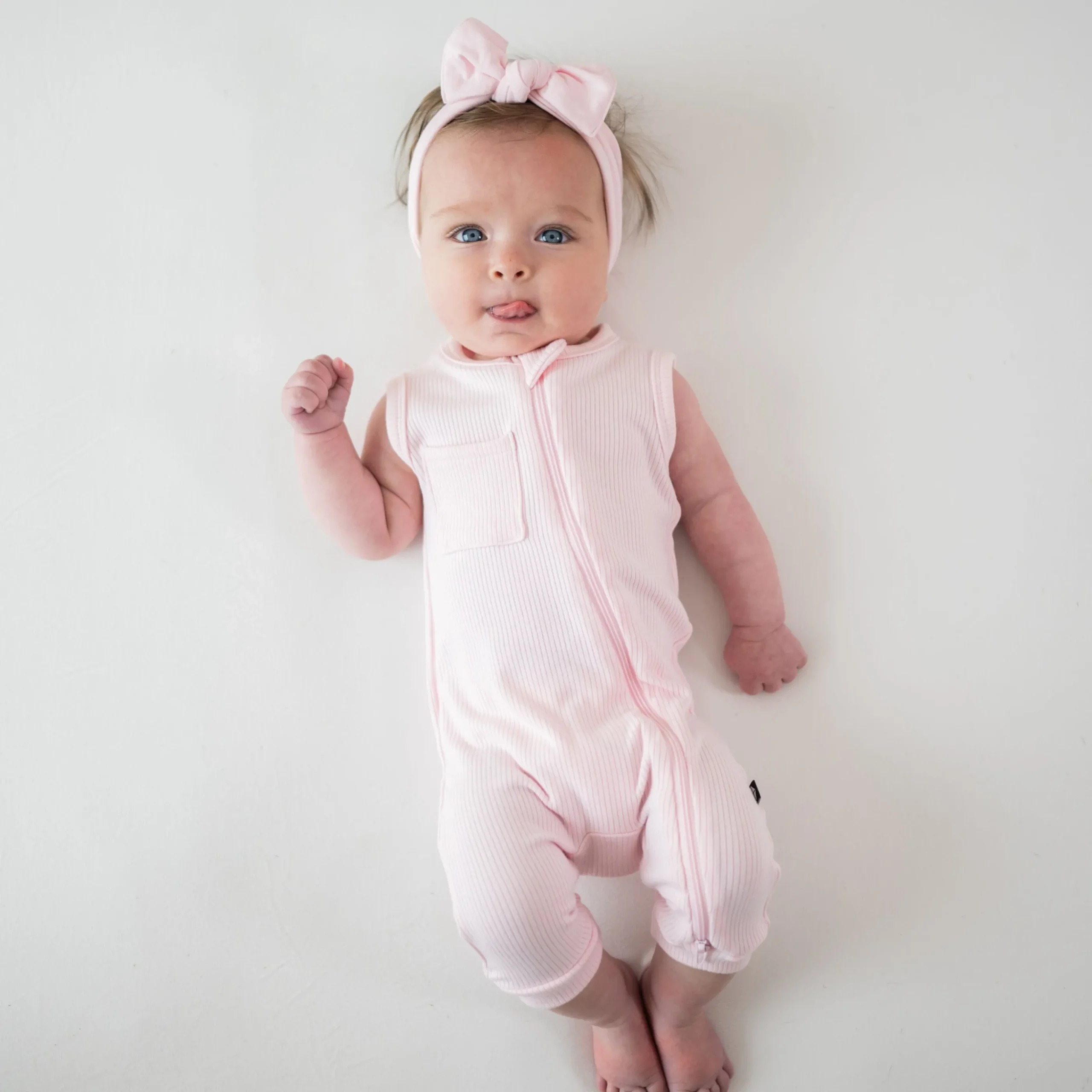 Ribbed Zippered Sleeveless Romper in Sakura