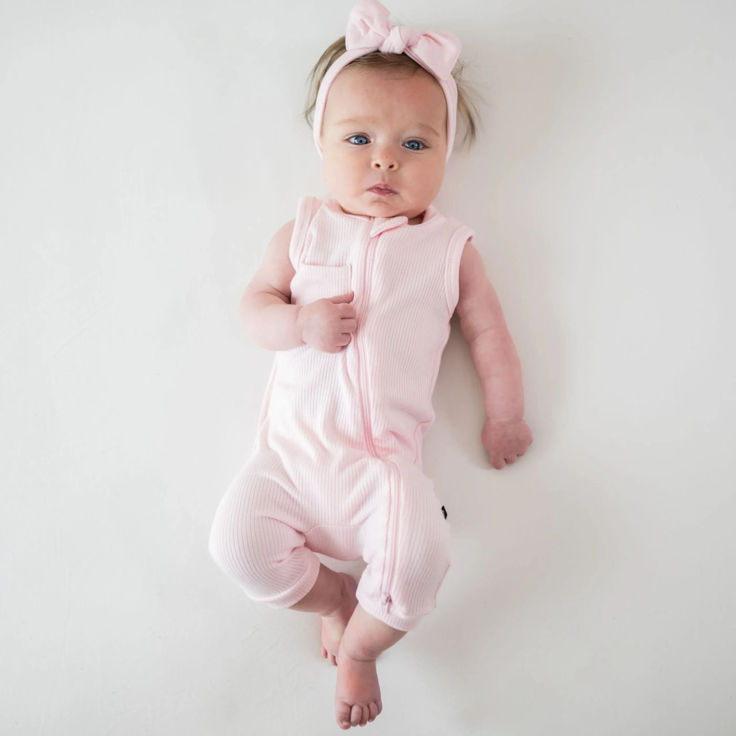 Ribbed Zippered Sleeveless Romper in Sakura
