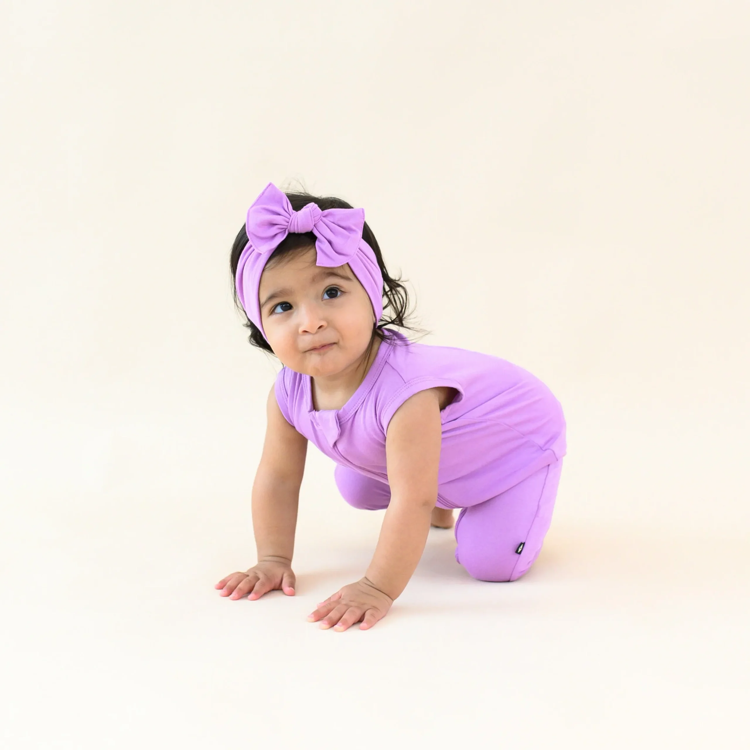 Zippered Sleeveless Romper in Poi